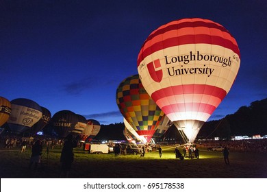 Bristol, UK: August 13, 2016: Night Glow at the Bristol International Balloon Fiesta. The annual event has become Europe’s largest hot air balloon festival. The Loughborough University balloon.