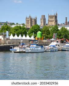 BRISTOL, UK - JULY 17, 2021. View across the Floating Harbour towards the Science Centre, the Cathedral and the Wills Tower in Bristol, England, UK.