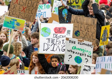 BRISTOL, UK - MARCH 3, 2019:Bristol College Students And Schoolchildren Carrying Climate Change Placards And Signs Are Pictured Taking Part In A Climate Change Protest In Bristol.