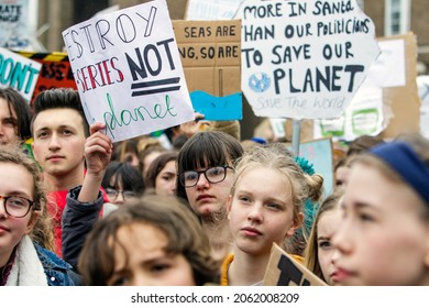 BRISTOL, UK - MARCH 3, 2019:Bristol College Students And Schoolchildren Carrying Climate Change Placards And Signs Are Pictured Taking Part In A Climate Change Protest In Bristol.