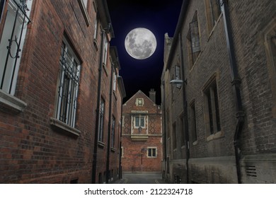 British architecture. Oxford street on dark photo with big full moon in the sky. - Powered by Shutterstock