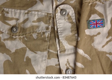 British Army Desert Uniform Jacket And A Flag