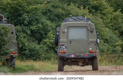 British Army Land Rover Defender Wolf Light Utility Vehicle On A Military Exercise, Salisbury Plain UK