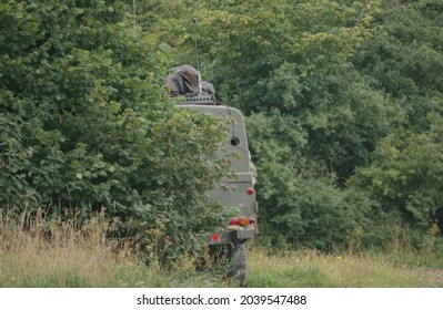 British Army Land Rover Defender Wolf Light Utility Vehicle On A Military Exercise, Salisbury Plain UK