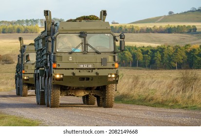 British Army MAN SV 8x8 EPLS Logistics Truck Driving An Unmade Road On A Military Exercise UK