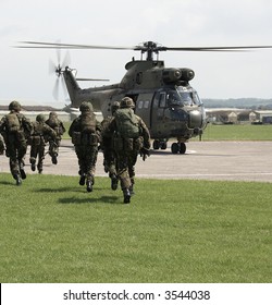 British Army Soldiers Board Helicopters