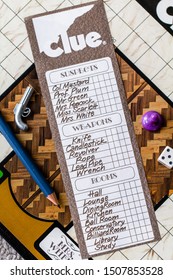BRITISH COLUMBIA, CANADA - SEPTEMBER 14, 2019: Clue 1972 (Second Edition) - The Board With Checklist, Tokens, Die, Pencil, Cards And Checklist All Ready To Play The Game