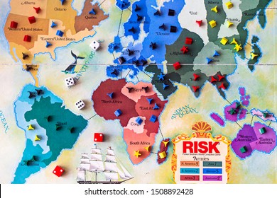 BRITISH COLUMBIA, CANADA - SEPTEMBER 14, 2019: 1975 Risk Board Game - With Cards, Dice, And Tokens