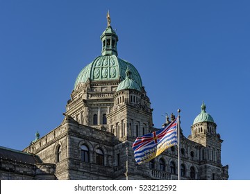 British Columbia Parliament Building BC Flag Victoria BC Canada on a against a blue sky