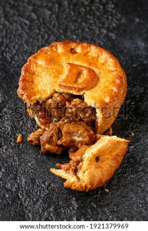 British duck pie on rustic dark background Stock photo © 