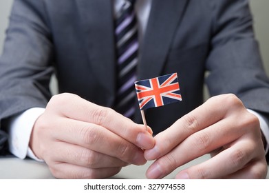British Flag and businessman - Shutterstock ID 327974558
