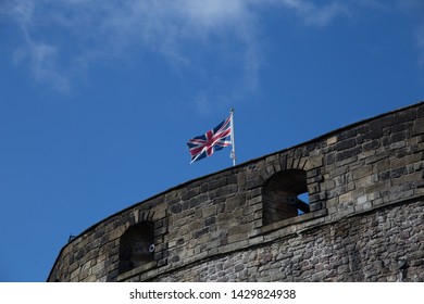 British Flag Flying Over Castle Wall