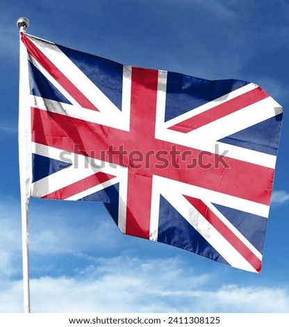 British flag on cloudy sky. flying in the sky
