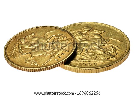 British full and half Sovereign gold coins isolated on white background