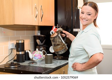 British Health Care Worker At A Patients Home