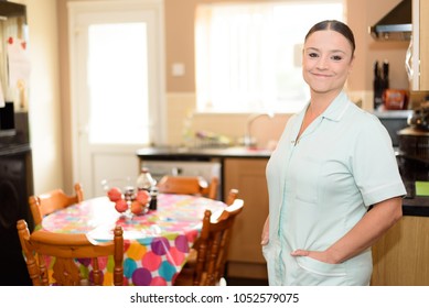British Health Care Worker At A Patients Home