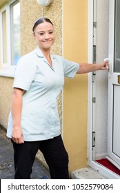 British Health Care Worker At A Patients Home