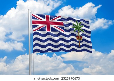 British Indian Ocean Territory national flag waving in the wind on clouds sky. High quality fabric. International relations concept - Shutterstock ID 2323990673
