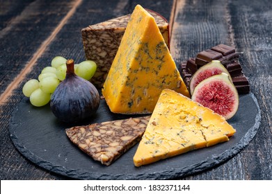 British And Irish Cheeses, Tasting Plate With Blue Shropshire, Brown Porter Cheese And Smoked Cheddar Close Up