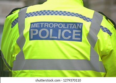 British Metropolitan Police Officer In Hi-visibility Uniform