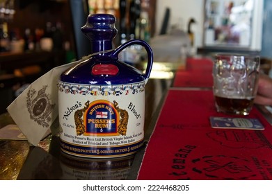 British Navy Pusser's Rum Jug At The Bar In The Pub. BOSTON Lincolnshire UK. Oct. 2022 