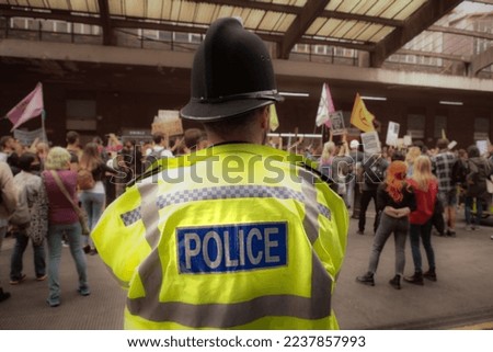 British police officer policing a protest in London