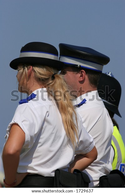 British Police Uniform Blonde Female Policewoman Stock