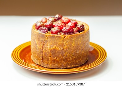 British pork pie topped with whole cranberries and  a rich ruby port jelly, traditional English food