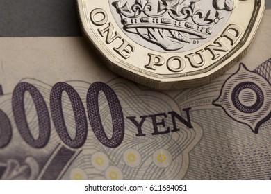 British Pound Coin And Japanese Yen Trade Exchange Rate