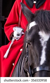 British Royal Guard on Horseback, Sword, White Glove and Red Jacket