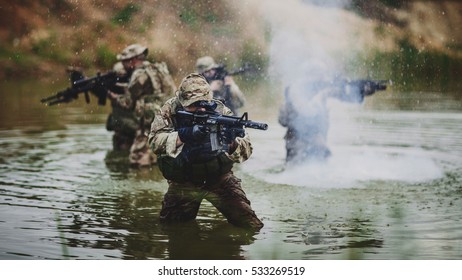 British Special Forces Soldiers With Weapon.