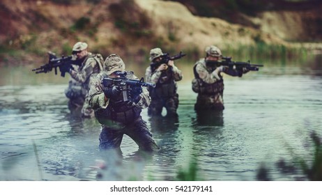 British Special Forces Soldiers With Weapon.