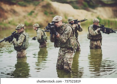 British Special Forces Soldiers With Weapon.