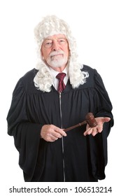 British style judge wearing a wig.  Isolated on white.