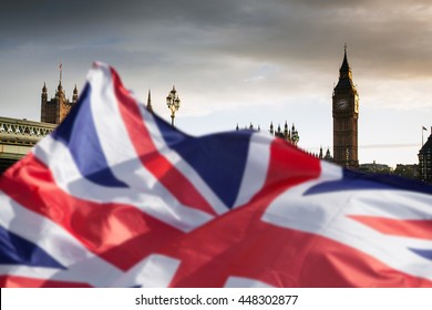 British union jack flag and Big Ben Clock Tower and Parliament house at city of westminster in the background - Brexit