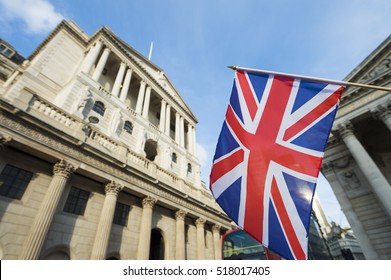 British Union Jack flag flying in front of the Bank of England in the City of London financial center