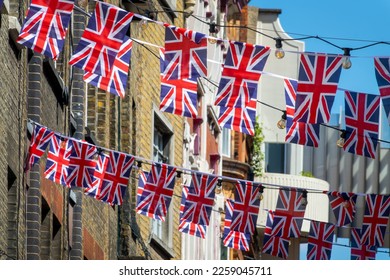 British Union Jack flag garlands in a street in London, UK - Shutterstock ID 2259045711