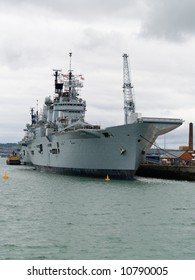 British War Ship Tied Alongside.