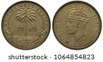 British West Africa coin 2 two shillings 1949, palm tree divides date, denomination below, head of King George VI left, , first year of issue under name of King George V, value in words around center 
