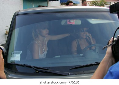 Brittany spears and mother lynn spears in car calling 911 after running of photographer