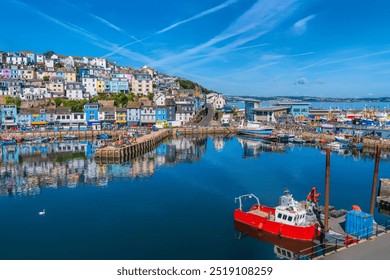 Brixham Devon harbour view to fish market and port with boats England UK