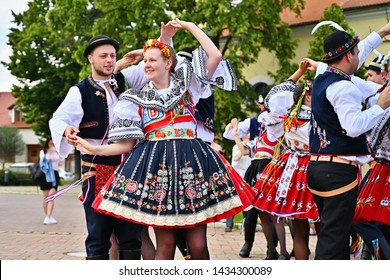 Brno - Bystrc, Czech Republic, June 22, 2019. Traditional Czech feast. Folk Festival. Girls and boys dancing in beautiful costumes. An old Christian holiday, a day of abundance, joy and prosperity.