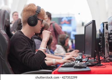 BRNO, CZECH REPUBLIC - APRIL 30, 2016: Young Man Sits On Gaming Chair And Plays Game On PC At Animefest, Anime Convention On April 30, 2016 Brno, Czech Republic 