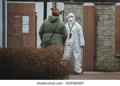 Brno, Czech Republic - March 4 2021: A Woman Talks To A Healthcare Worker At A Corona Virus Test Site.