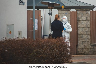 Brno, Czech Republic - March 4 2021: A Woman Talks To A Healthcare Worker At A Corona Virus Test Site.