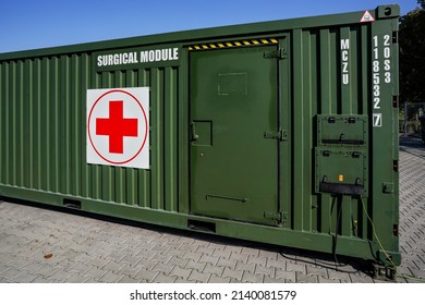 Brno, Czechia - October 08, 2021: Green Metal Army Container Box - Surgical Module - With Red Cross, Setup As Field Ambulance Demonstration During IDET Military And Defence Exhibition Fair