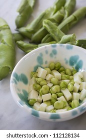Broad bean and cheese salad in bowl