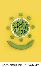 Broad Beans Green Vegetable Health Food, High In Folate, Fibre, Antioxidants, Potassium And Vitamin B. Natural Crop To Lower Cholesterol. Abstract Design On Yellow Background.