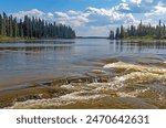 A Broad River Starting to Go Over Some Falls at Pisew Falls Provincial Park in Manitoba