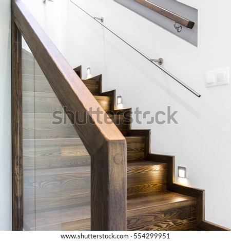 Similar – Image, Stock Photo a wooden staircase with railing leads from the sandy beach to a dune with dune grass and flagpole